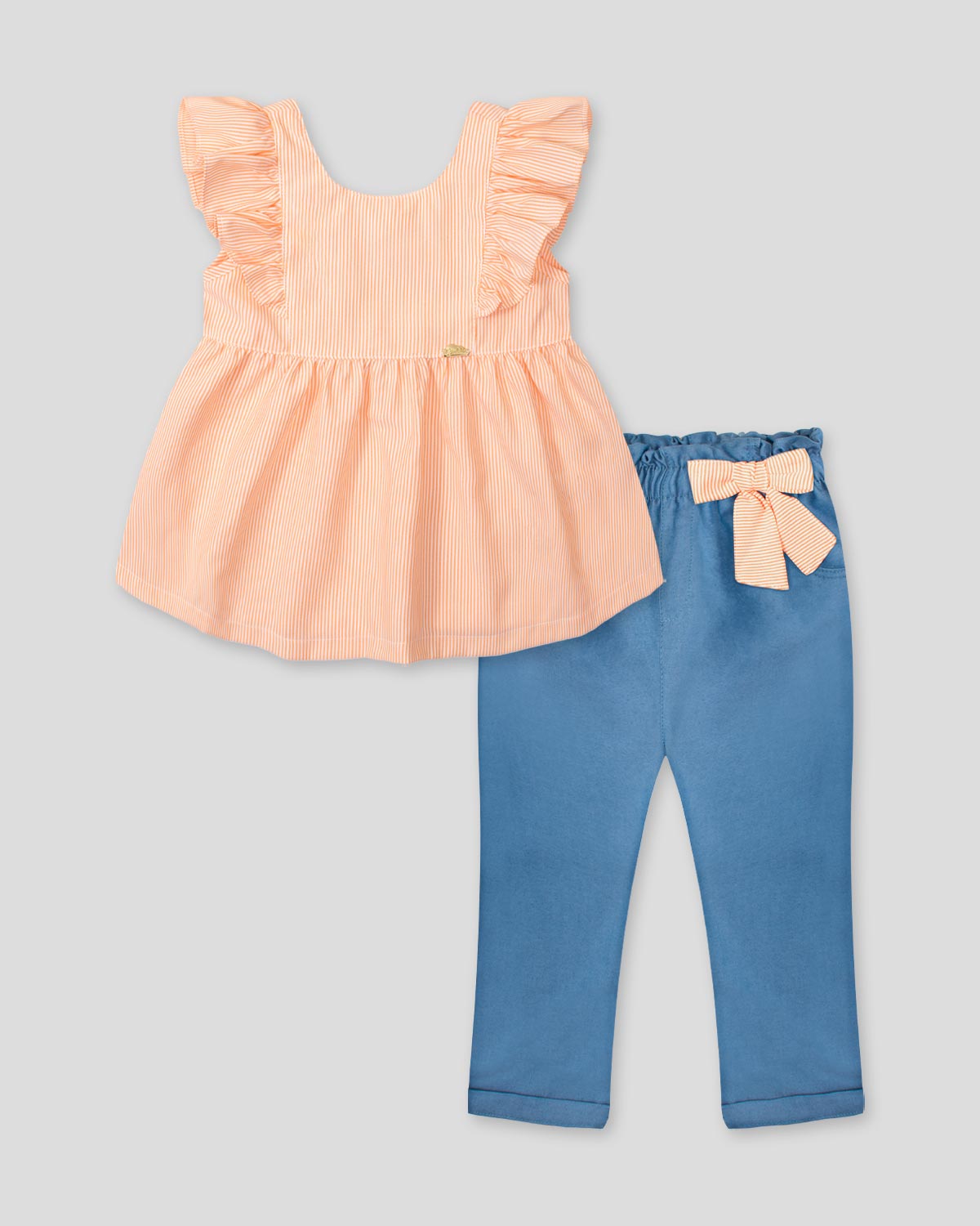 Conjunto blusa de líneas naranjas con bolero en manga y leggins chambray con detalle de moño para bebé niña