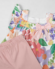 Conjunto blusa con estampado de flores de mangas con boleros, moñito rosa y leggins para bebé niña