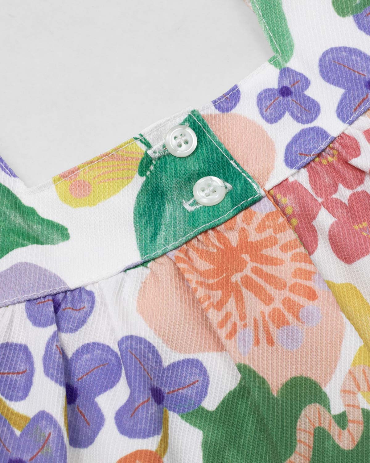 Conjunto blusa con estampado de flores de mangas con boleros, moñito rosa y leggins para bebé niña