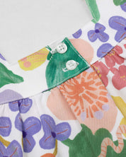 Conjunto blusa con estampado de flores de mangas con boleros, moñito rosa y leggins para bebé niña