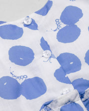 Conjunto blusa con estampado de lunares azules y leggins blanco para bebé niña