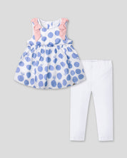 Conjunto blusa con estampado de lunares azules y leggins blanco para bebé niña