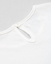 Conjunto blusa blanca sin mangas con aplique de flor y short lila para bebé niña