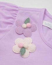 Conjunto camiseta lila con florecitas y leggins en rib para bebé niña