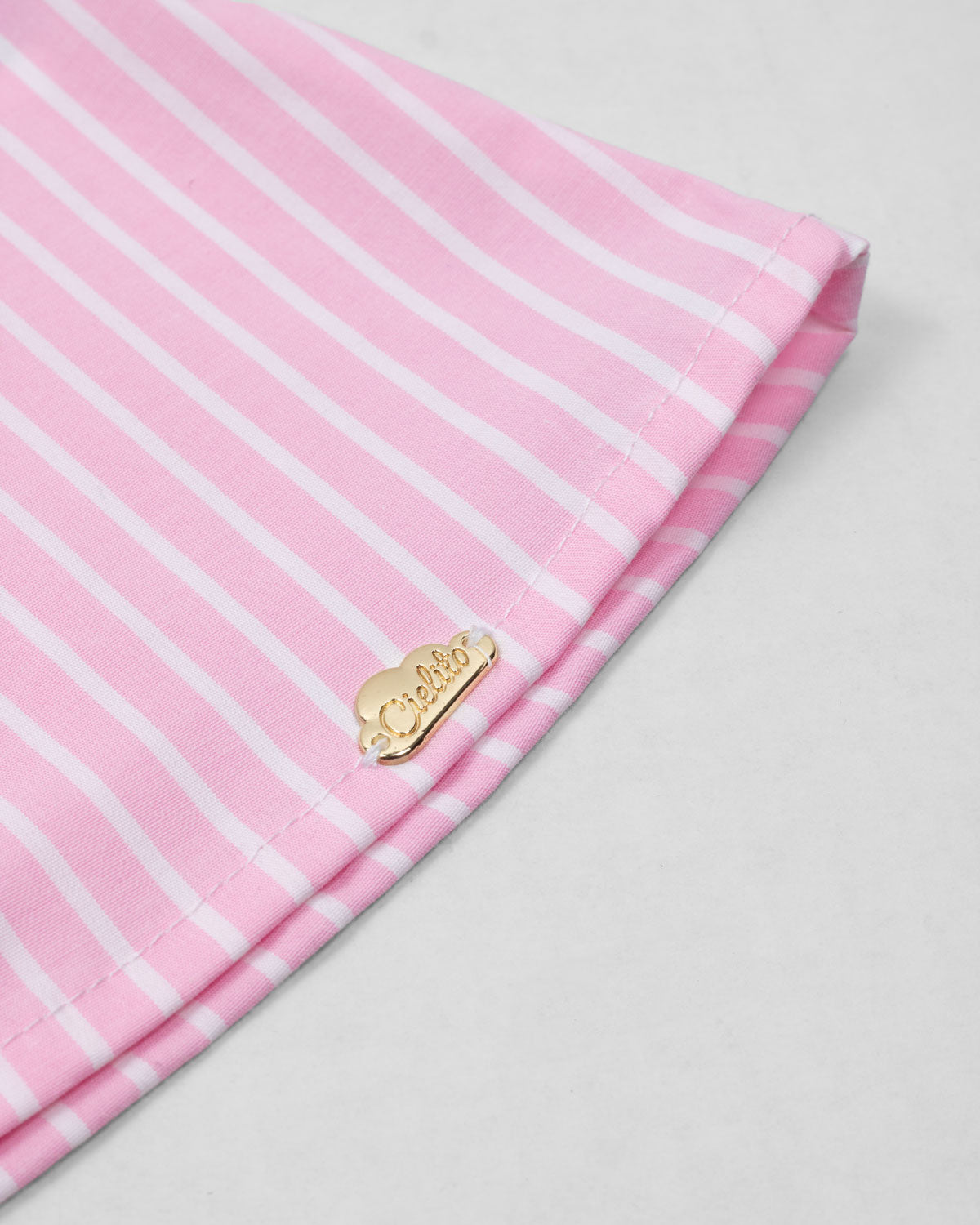 Conjunto blusa rosa con estampado de líneas y leggins con conejitos para bebé niña