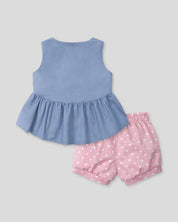 Conjunto blusa azul con moñitos y short rosa con estampado para bebé niña