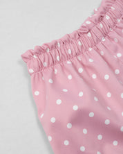 Conjunto blusa azul con moñitos y short rosa con estampado para bebé niña