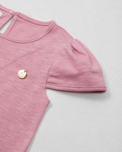 Conjunto blusa rosa con encaje de florecitas y leggins en rib para bebé niña