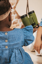 Vestido body en chambray azul de mangas con boleros y moño estampado para bebé niña