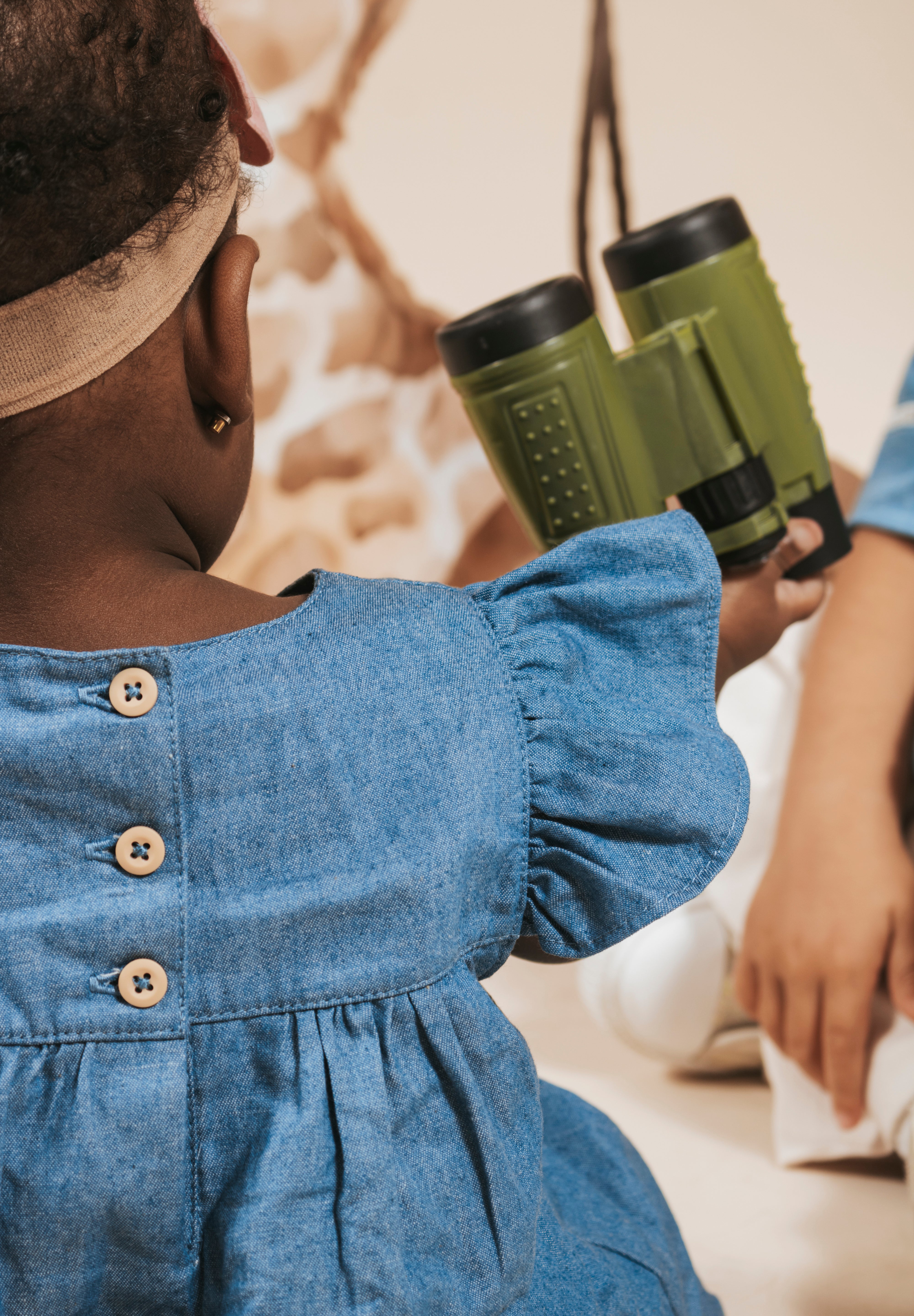 Vestido body en chambray azul de mangas con boleros y moño estampado para bebé niña