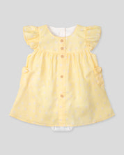 Vestido body amarillo con estampado de flores y bolsillitos en los costados para bebé niña