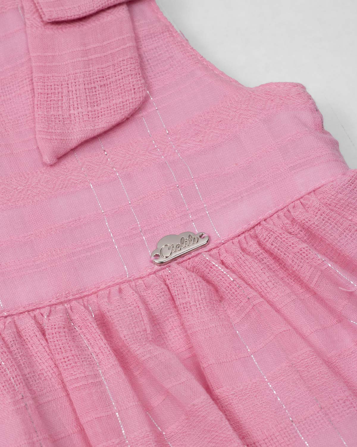 Vestido body rosado con moñitos en los hombros para bebé niña