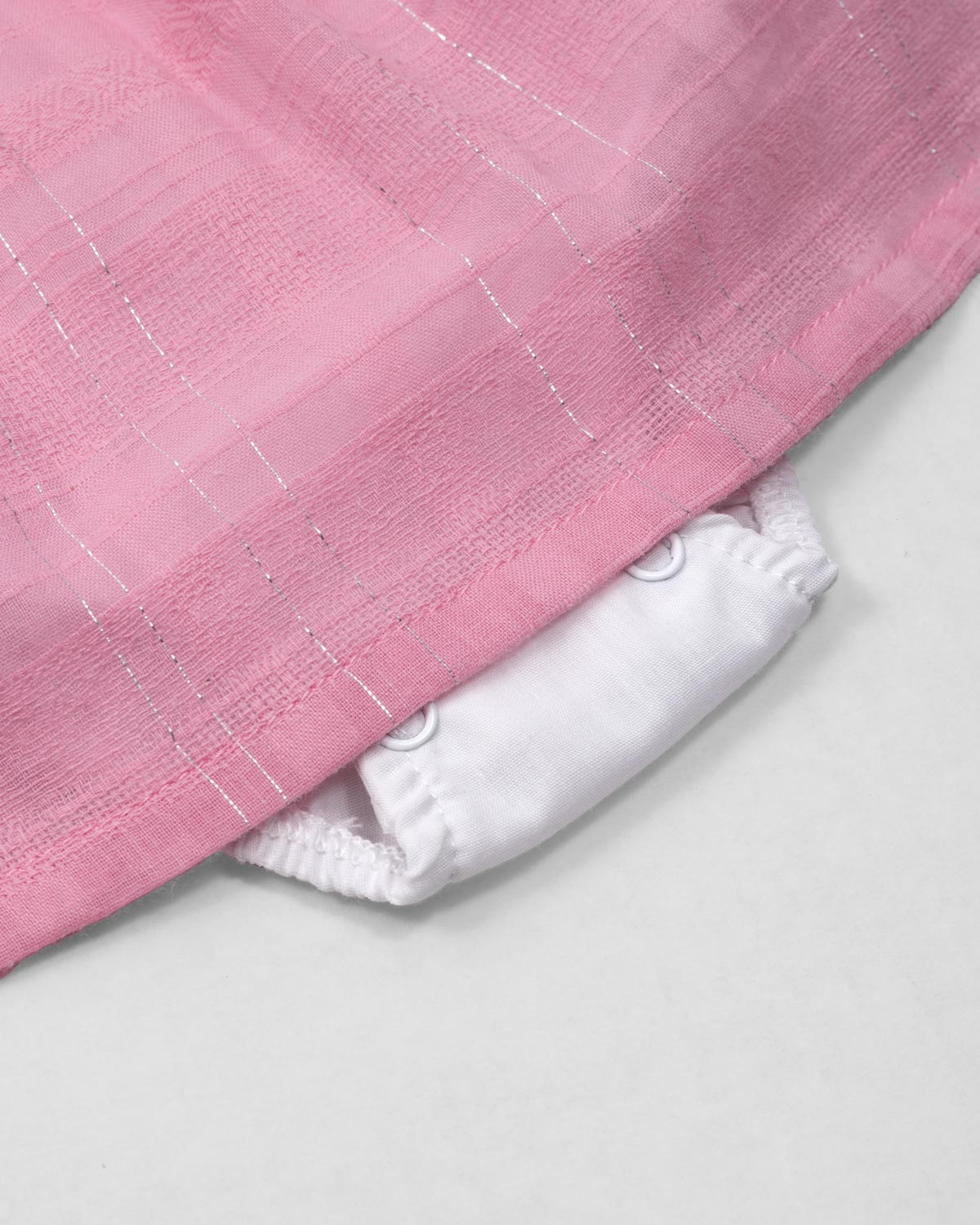 Vestido body rosado con moñitos en los hombros para bebé niña