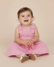 Vestido body rosado con moñitos en los hombros para bebé niña