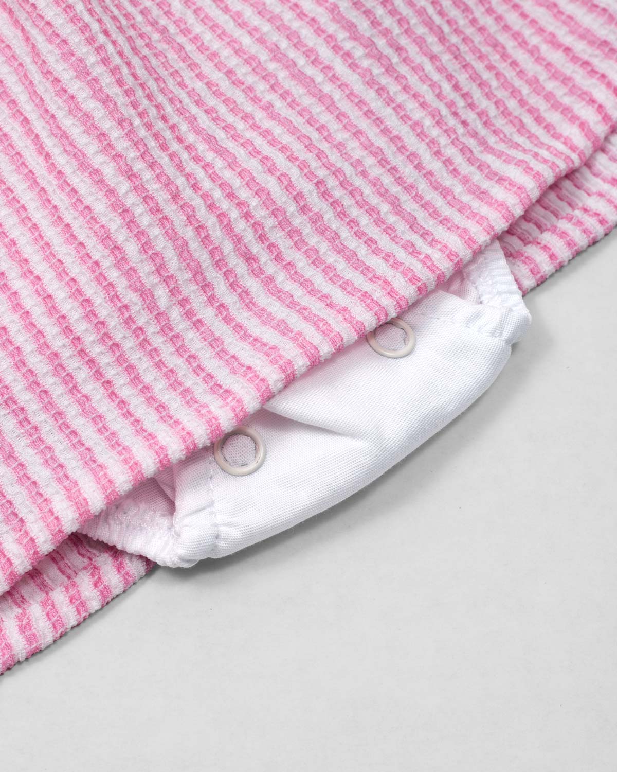 Vestido body de rayas rosa con orejas de conejito en espalda para bebé niña