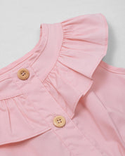 Enterizo corto en popelina con bolero, botonadura frontal y cinturón estampado para bebé niña