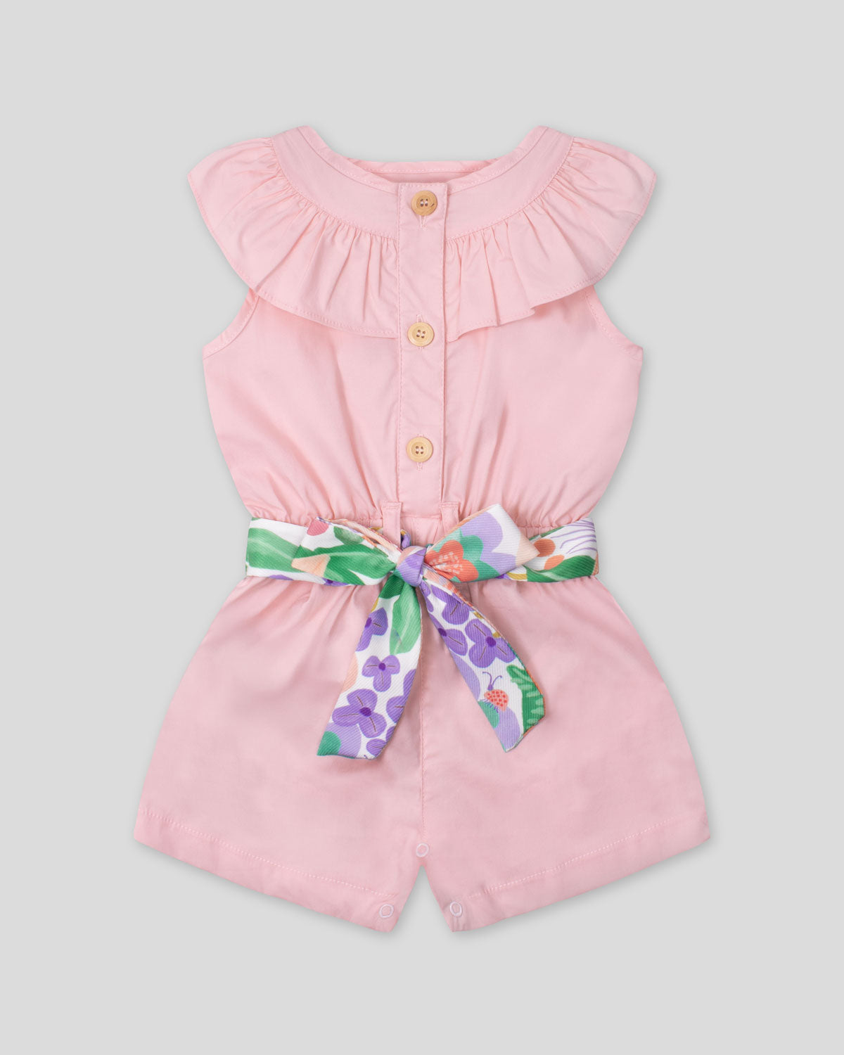 Enterizo corto en popelina con bolero, botonadura frontal y cinturón estampado para bebé niña