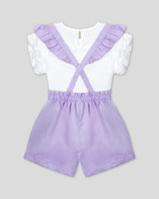 Conjunto blusa blanca con bordado, mangas con boleros y short lila con tirantes para niña