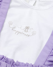 Conjunto blusa blanca con bordado, mangas con boleros y short lila con tirantes para niña