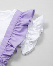 Conjunto blusa blanca con bordado, mangas con boleros y short lila con tirantes para niña