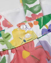 Conjunto blusa de tiras con estampado de flores, boleros y leggins rosado para niña