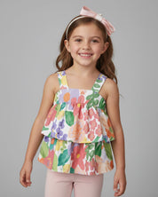 Conjunto blusa de tiras con estampado de flores, boleros y leggins rosado para niña