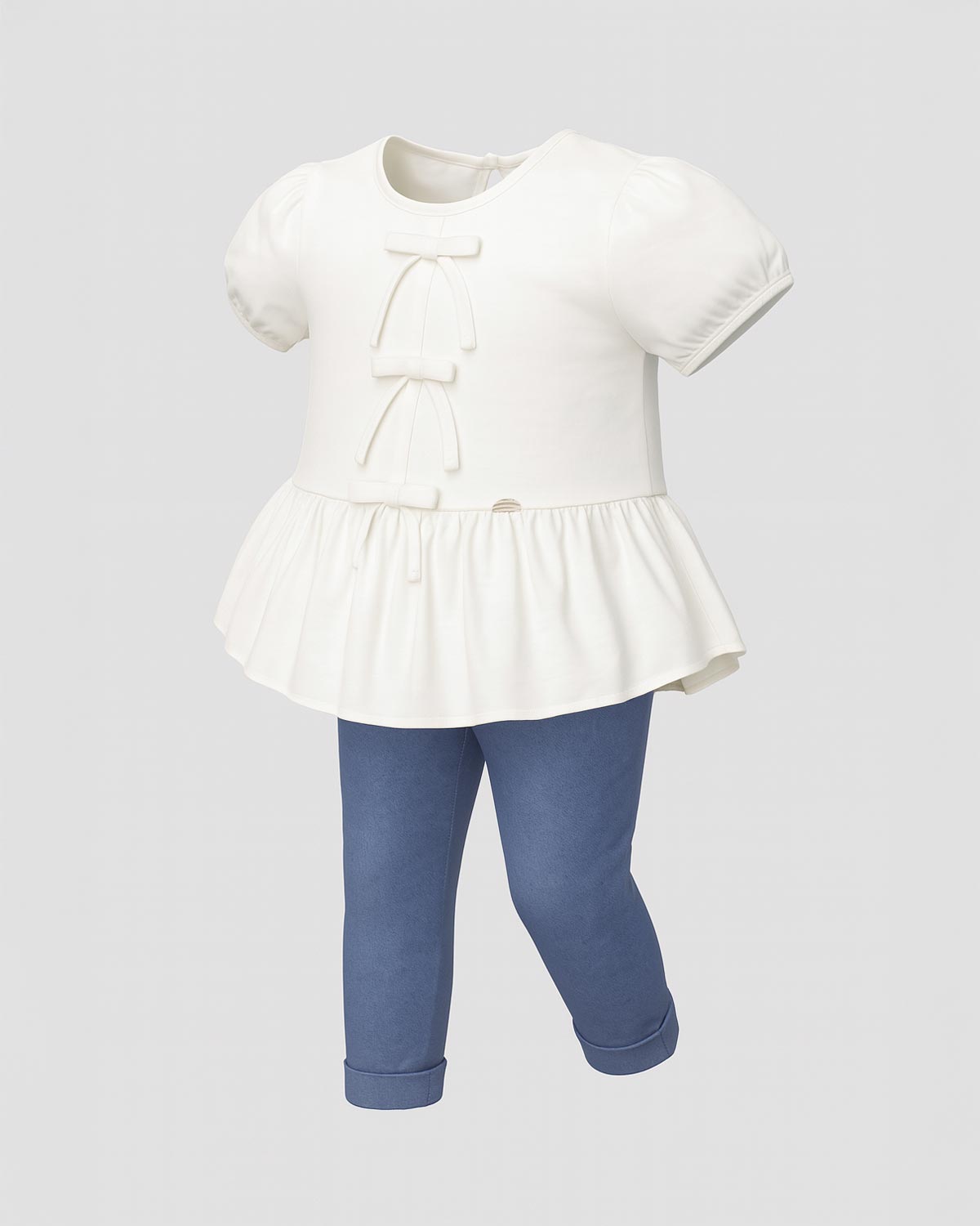 Conjunto blusa blanca con detalle de moñitos, terminado en bolero y leggins azul para niña