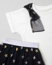 Conjunto camiseta blanca con moño y falda negra en tul con estrellas para niña