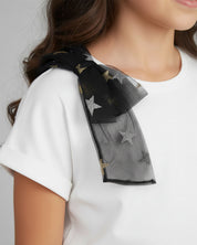 Conjunto camiseta blanca con moño y falda negra en tul con estrellas para niña