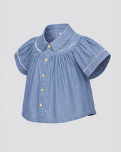 Blusa en chambray con botones para niña