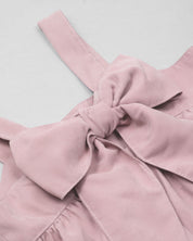 Blusa rosa pastel de tiras con moño en espalda para niña