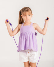Blusa lila de tiras con moño en espalda para niña