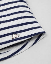 Blusa blanca de rayas azul navy sin mangas para niña