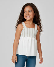 Blusa en lino con textura tejida y moño en espalda para niña