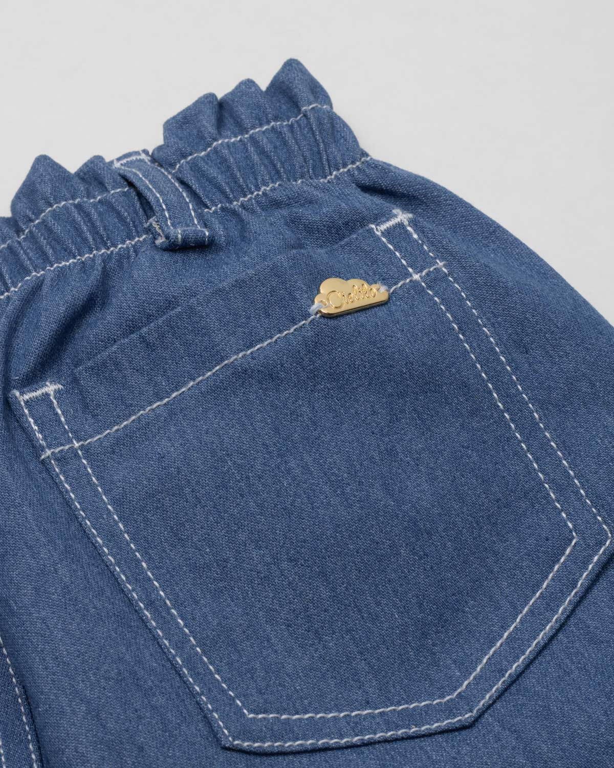 Pantalón azul paperbag para niña