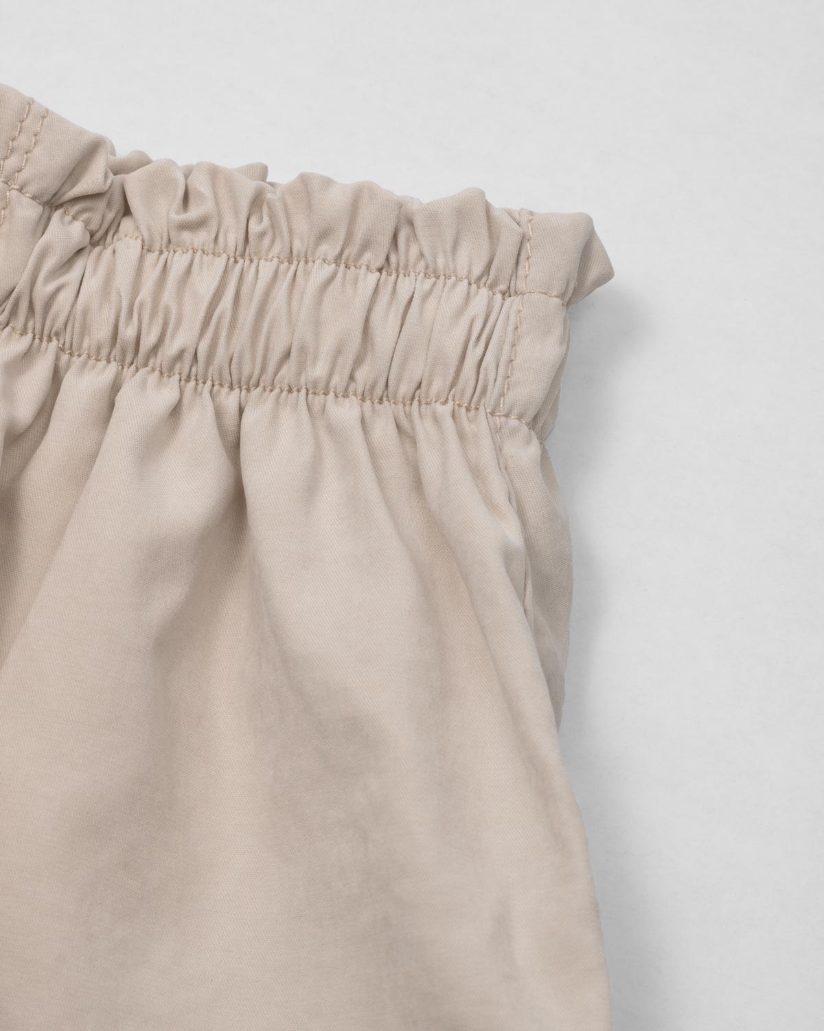 Short beige paperbag para niña