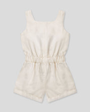 Enterizo en lino con botonadura y cinturón estampado para niña