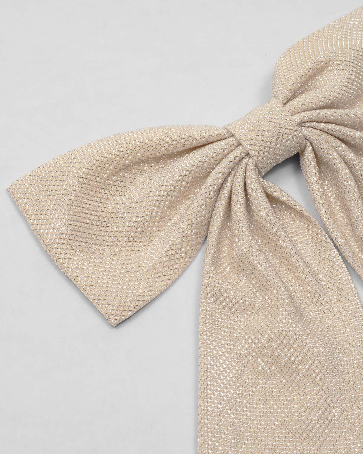 Moño pinza dorado para niña