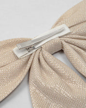 Moño pinza dorado para niña