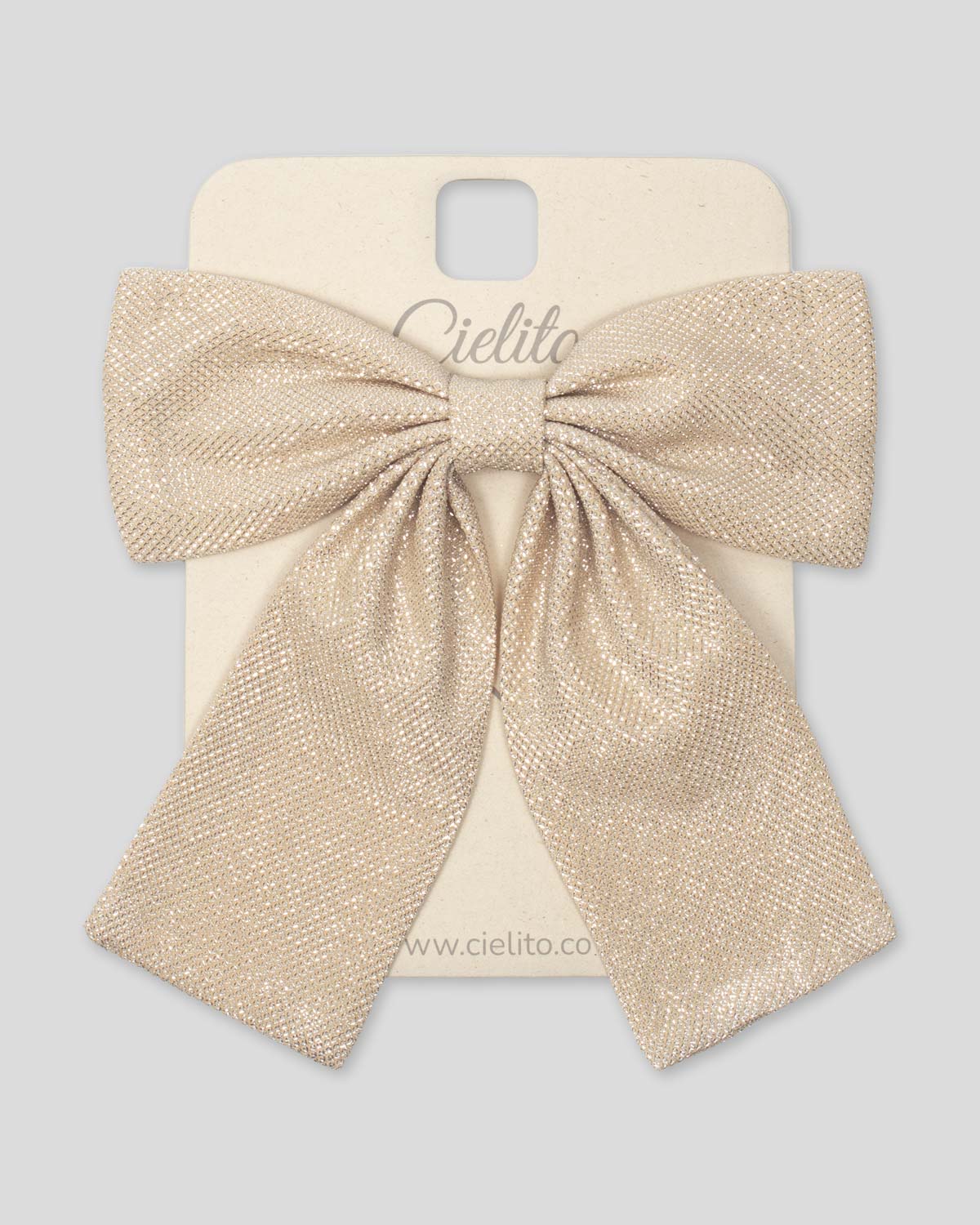 Moño pinza dorado para niña