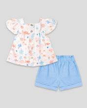 Conjunto blusa con print, manga con detalle de encaje y short azul para bebé niña - Cielito