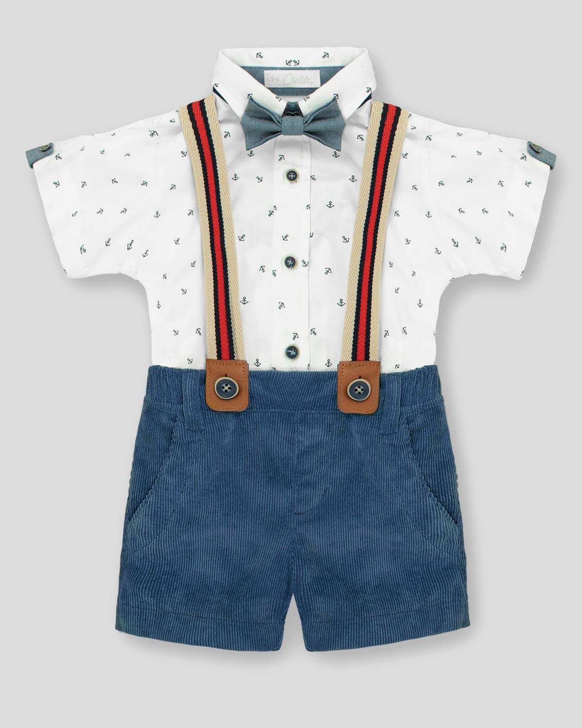 Conjunto camisa tipo body blanco con short azul y cargaderas para bebé niño