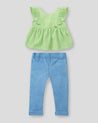 Conjunto blusa verde con boleros en hombros y leggins para bebé niña