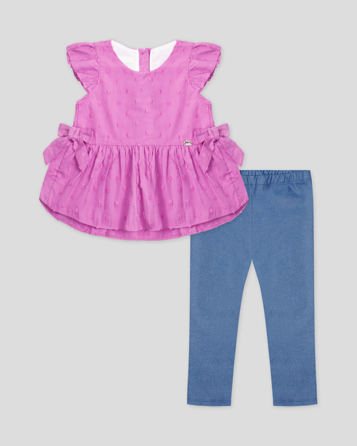 Conjunto blusa morada de puntos con detalles de moño y leggins azul para bebé niña