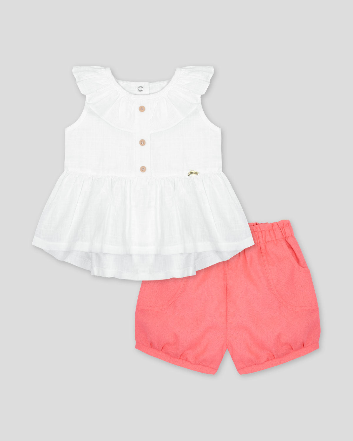 Conjunto blusa blanca en lino con boleros y short rosa para bebé niña