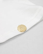 Conjunto camiseta blanca con corazón y short rosa para bebé niña