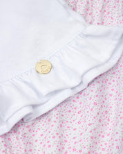 Conjunto blusa blanca con estampado de conejitos y short estampado para bebé niña