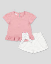 Conjunto blusa palo de rosa con moño y short blanco para bebé