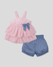 Conjunto blusa rosa estampadada de flores con boleros y short azul para bebé niña
