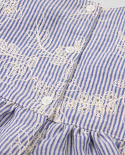 Conjunto blusa de rayas azul en tela hoja rota con moño rosa y falda short rosa bebé niña